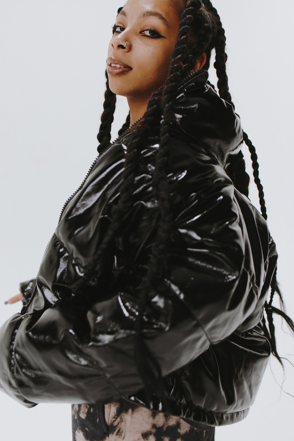 Woman in Oversized Black Leather Jacket and Shirt